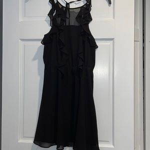 BCBG Generation black dress!  Sheer top, ties around neck, cute ruffles.
